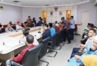 Proses pendandatanganan 27 berkas Naskah Perjanjian Hibah Daerah untuk rumah ibadah di Kota Batam | Foto: Dian