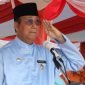 Plt Bupati Karimun, Anwar Hasyim saat memimpin upacara HUT Karimun ke-25 tahun pada, Sabtu (12/10/2024) | Foto: Nichita