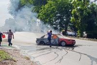 Potrer insiden kebakaran mobil sedan di depan SPBU | Foto : Zonamu/Dok. Warga