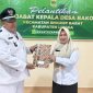 Plt. Camat Singkep Barat Lantik Pj Kades Bakong | Foto : Zonamu/Eki