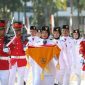Zahra Pembawa Baki Curi Perhatian di Upacara Batam | Foto : Zonamu/Ist