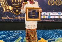 Direktur Utama, Siska Naritasari, S.E berhasil membawa BPR Tuah Karimun (Perseroda) mendapatkan penghargaan Prestigious Top Award dalam ajang Award Ceremony, Satu Prestasi Sejuta Inspirasi di Yogyakarta, Jumat (21/8/2026) | Foto: Zonamu/Humas BPR Tuah Karimun